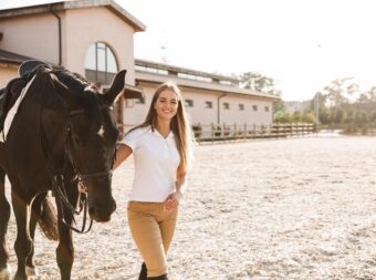 Beautiful woman with horse in countryside